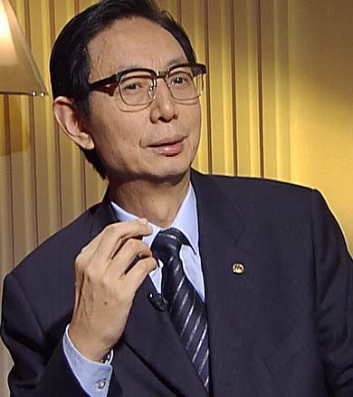 重庆力帆董事长尹明善:在战争中学习战争